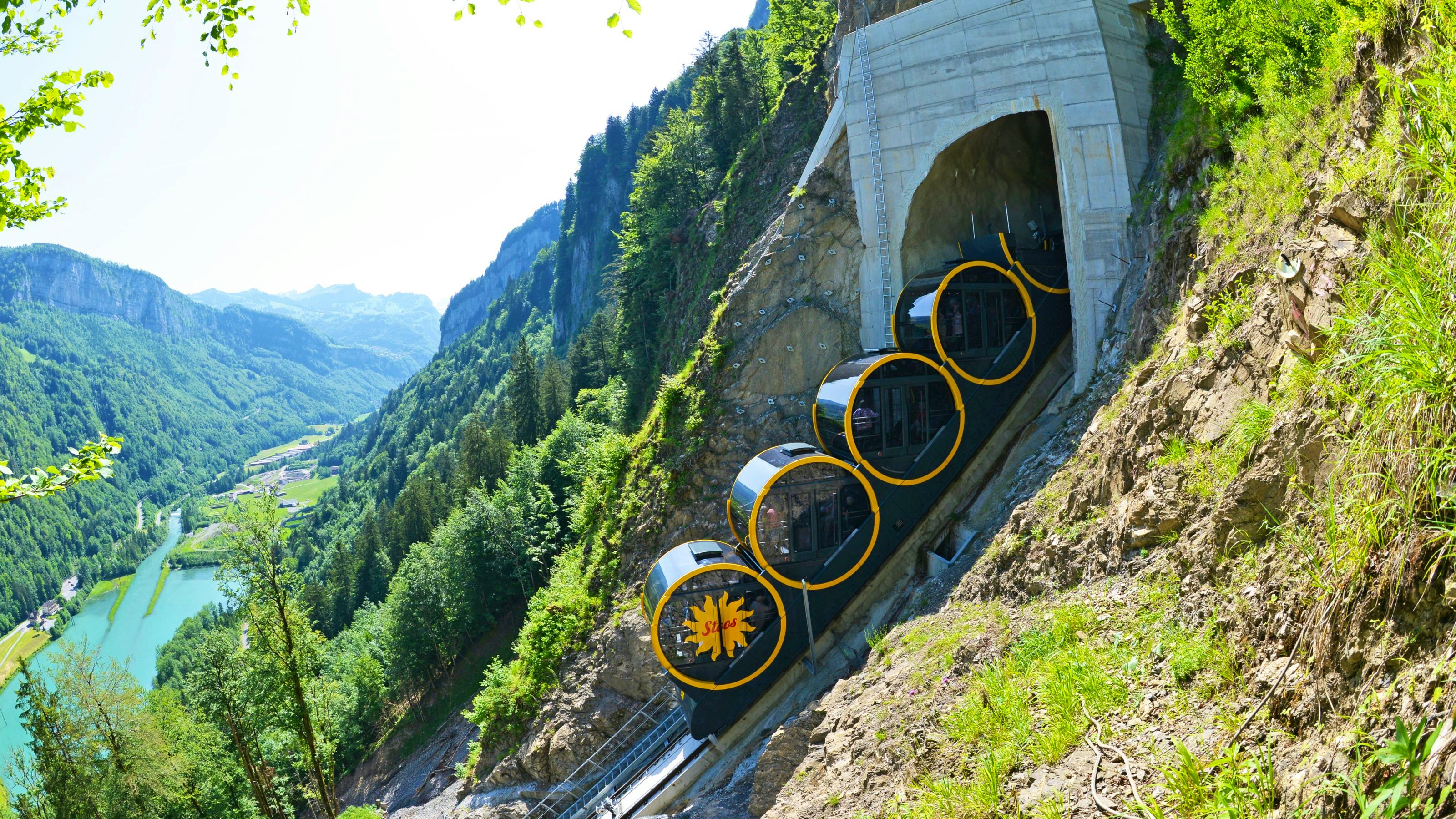The steepest funicular railway in the world travels up a mountain.